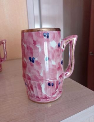 Juego de jarras y tazas de porcelana