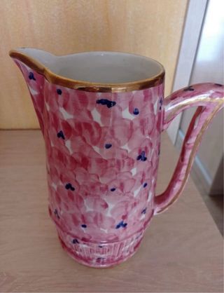 Juego de jarras y tazas de porcelana