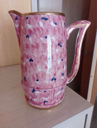 Juego de jarras y tazas de porcelana