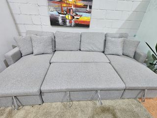 Sofá cama gris con doble arcón