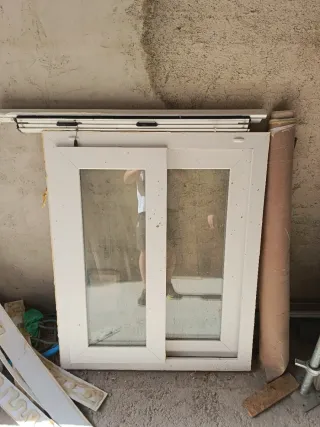 Ventana corredera doble Climalit con mosquitera