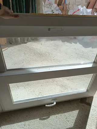 Ventana corredera doble Climalit con mosquitera