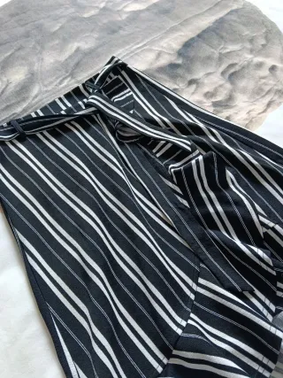 Falda por delante mas corta  rayas volantes