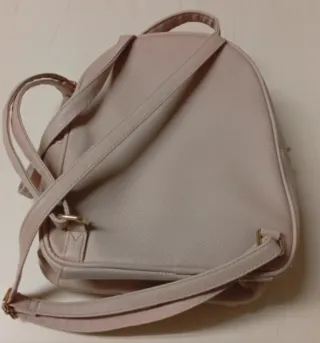 Mochila rosa maquillaje