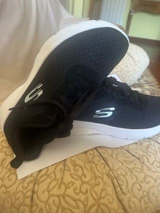 Scarpe Skechers nere, pulite pronte da  calzare