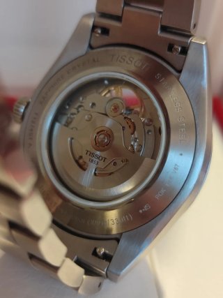 Reloj Tissot Gentleman Open Heart T1274071103101