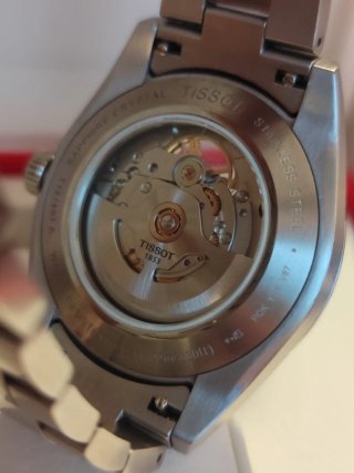 Reloj Tissot Gentleman Open Heart T1274071103101