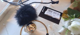 Collana FACIT con pom pom nero e cerchio oro