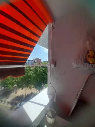 Toldo de tela y aluminio