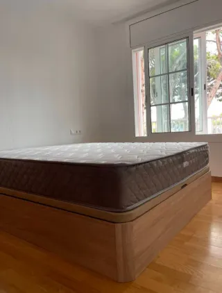 Canapé de madera y tela