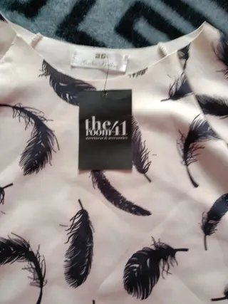 Vestido elegante estampado plumas