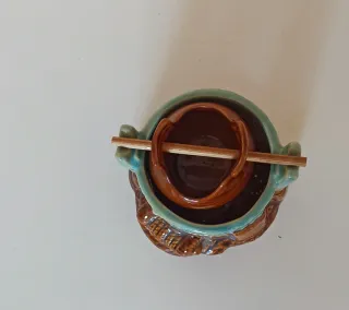 Portavelas de cerámica estilo pozo