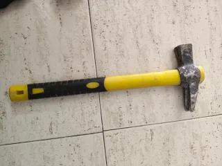 Cinturón y martillo encofrador