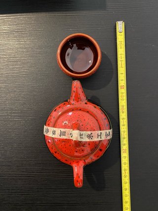 Juego de té de cerámica rojo y marrón