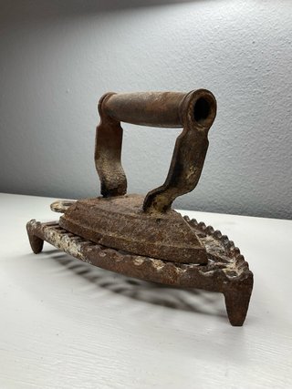 Plancha antigua de hierro