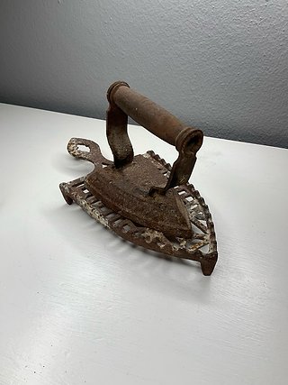 Plancha antigua de hierro