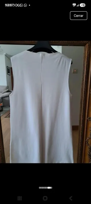 Vestido blanco con bolsillos negros
