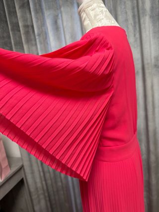 Mono fiesta rosa plisado