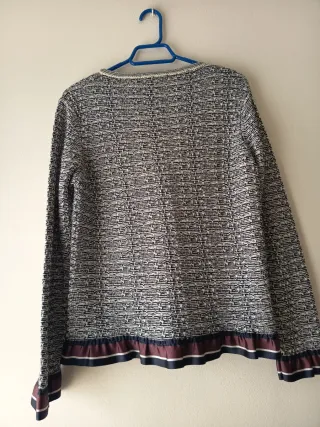 Chaqueta corta tweed con volantes