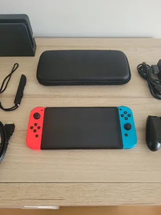 Nintendo Switch Oled como NUEVA + Accesorios