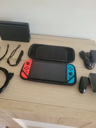 Nintendo Switch Oled como NUEVA + Accesorios