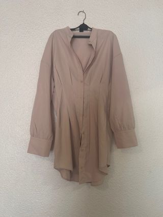 Chaqueta con flecos beige y marrón