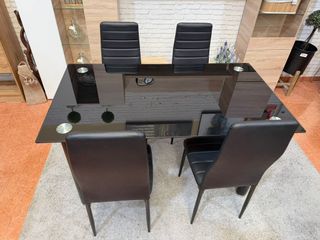 Mesa cristal negra y 4 sillas polipiel