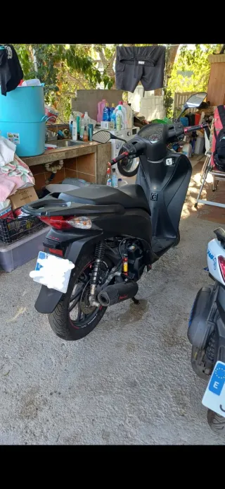Escape Leovince Honda SH 2017 Negro