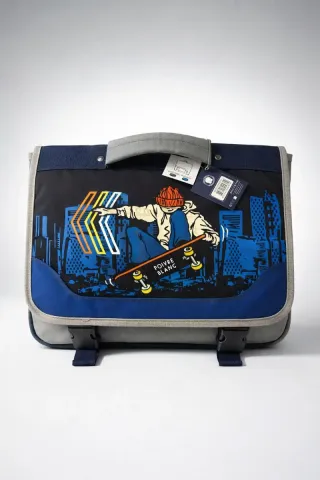 Bolso escolar Poivre Blanc con patinador