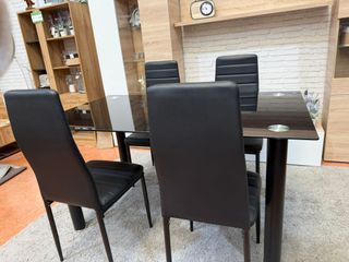 Mesa cristal negra + 4 sillas polipiel