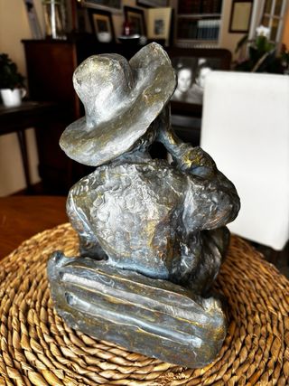Escultura de bronce