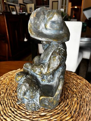 Escultura de bronce