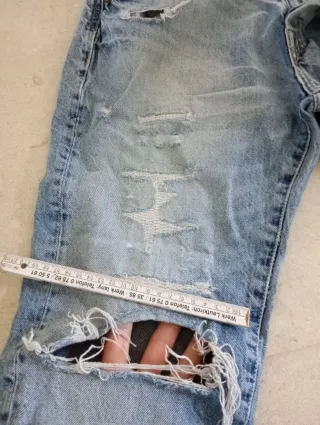 Jeans strappati ragazzo taglia 32/33