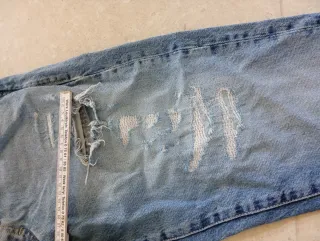 Jeans strappati ragazzo taglia 32/33