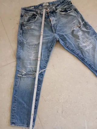 Jeans strappati ragazzo taglia 32/33