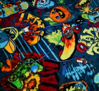 Dos Colgantes Corazón y Cristal Azul