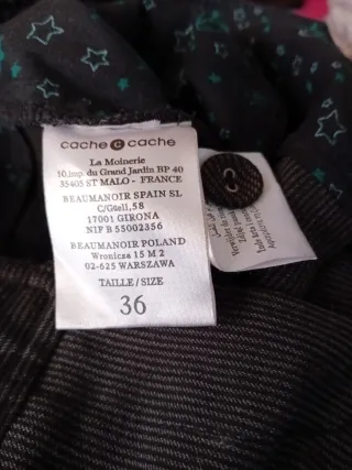 Pantalón corto gris con rayas