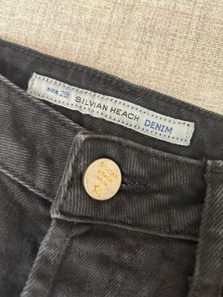 Jeans Silvian Heach neri con banda oro