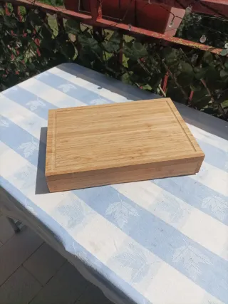 Tabla de cortar y juego de cuchillos