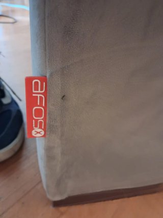 Sofá de tela terciopelo gris