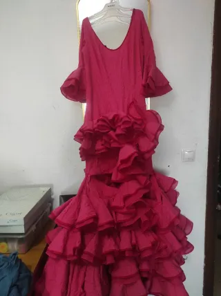 Traje de flamenca rosa volantes