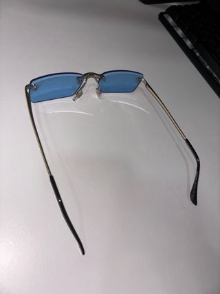 Occhiali da sole blu rettangolari