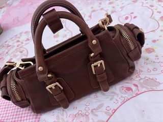 Bolso de piel marrón mini