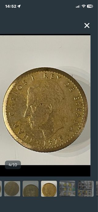 Moneda antigua dorada