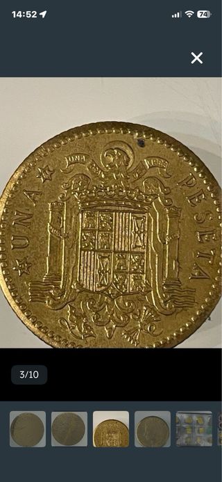 Moneda antigua dorada