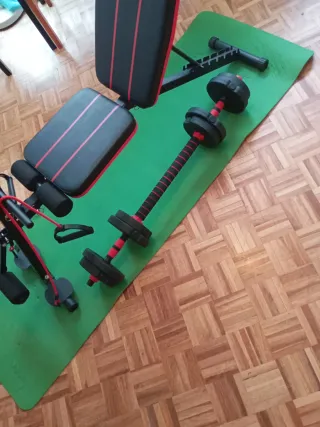 Banco de pesas con accesorios