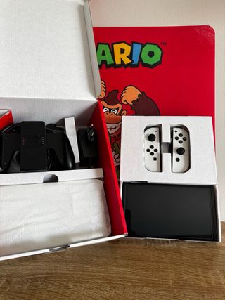 Nintendo Switch OLED con scatola completa + accessori
