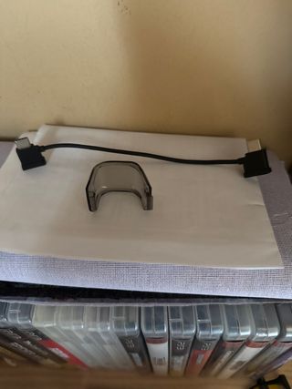 Protector y cable para dron