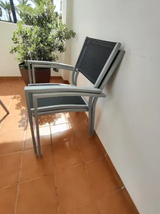 Juego comedor exterior cristal y metal.