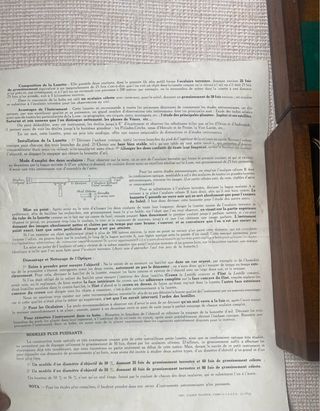 Catalejo vintage de latón con caja